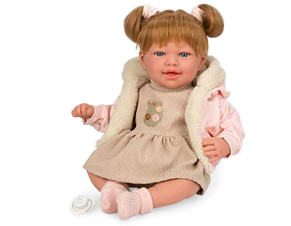 Muñeca Arias Adi con vestido beige y chaqueta rosa